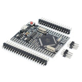 Mega 2560 Pro Mini Embed CH340G Atmega 2560-16A With Male Pin Headers - a black rectangular microcontroller board with a red reset button, USB port, and loose male pin header strips.