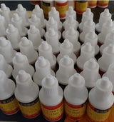 Metal Soldering Flux 25ML Bottle - shown as a bulk collection of small white plastic squeeze bottles with yellow labels and pointed caps.