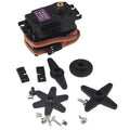 MG996R 180 Degree Metal Gear Servo Motor (plastic Gear) - with a black plastic body, a three-pin connector, and various black plastic servo horns and mounting screws laid out on a white surface.