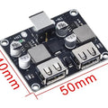 MH-KC24 2-channel DC-DC Buck Converter With QC3.0 Fast Charging - 6-32V To 3V/5V/9V/12V/24V - a black rectangular circuit board with a DC power jack, two USB ports, capacitors, and dimension labels.