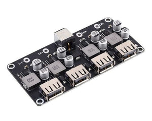 MH-KC24 4-channel DC-DC Buck Converter With QC3.0 Fast Charging - 6-32V To 3V/5V/9V/12V/24V - a black circuit board featuring a DC power jack, four USB-A output ports, and several capacitors and inductors.