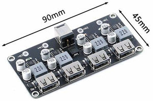 MH-KC24 4-channel DC-DC Buck Converter With QC3.0 Fast Charging - 6-32V To 3V/5V/9V/12V/24V - a black rectangular circuit board with a DC power jack, four USB ports, capacitors, and inductors.