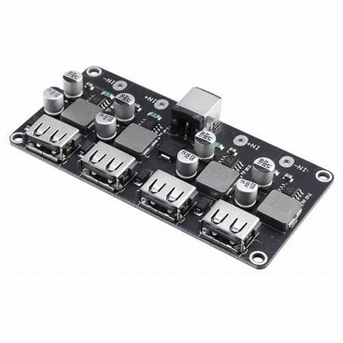 MH-KC24 4-channel DC-DC Buck Converter With QC3.0 Fast Charging - 6-32V To 3V/5V/9V/12V/24V - a black rectangular circuit board featuring four USB-A ports, a DC power barrel jack, and various capacitors.
