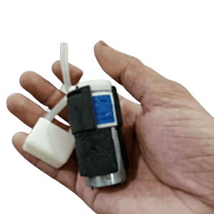 Micro Air Pump - held in a hand, featuring a silver cylindrical motor with a black foam casing, a blue label, and a white plastic nozzle with a tube.