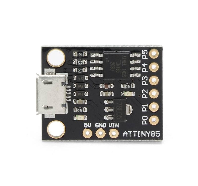 Micro USB Digispark ATTINY85 Mini USB Development Board - a black rectangular PCB featuring a Micro USB port, an Atmel chip, and labeled pin headers.