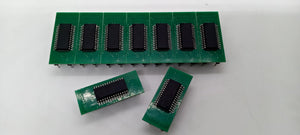 Microchip DSPIC30F2010 Microcontroller - 14-bit DSC with DSP - nine green circuit boards, each mounted with a black integrated circuit chip, on a white background.