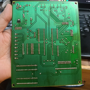 MikroDuino-II AVR ATMEGA32 Arduino Compatible Board Without LCD ,IC And Arduion - the green underside of the printed circuit board with visible solder joints and copper traces.