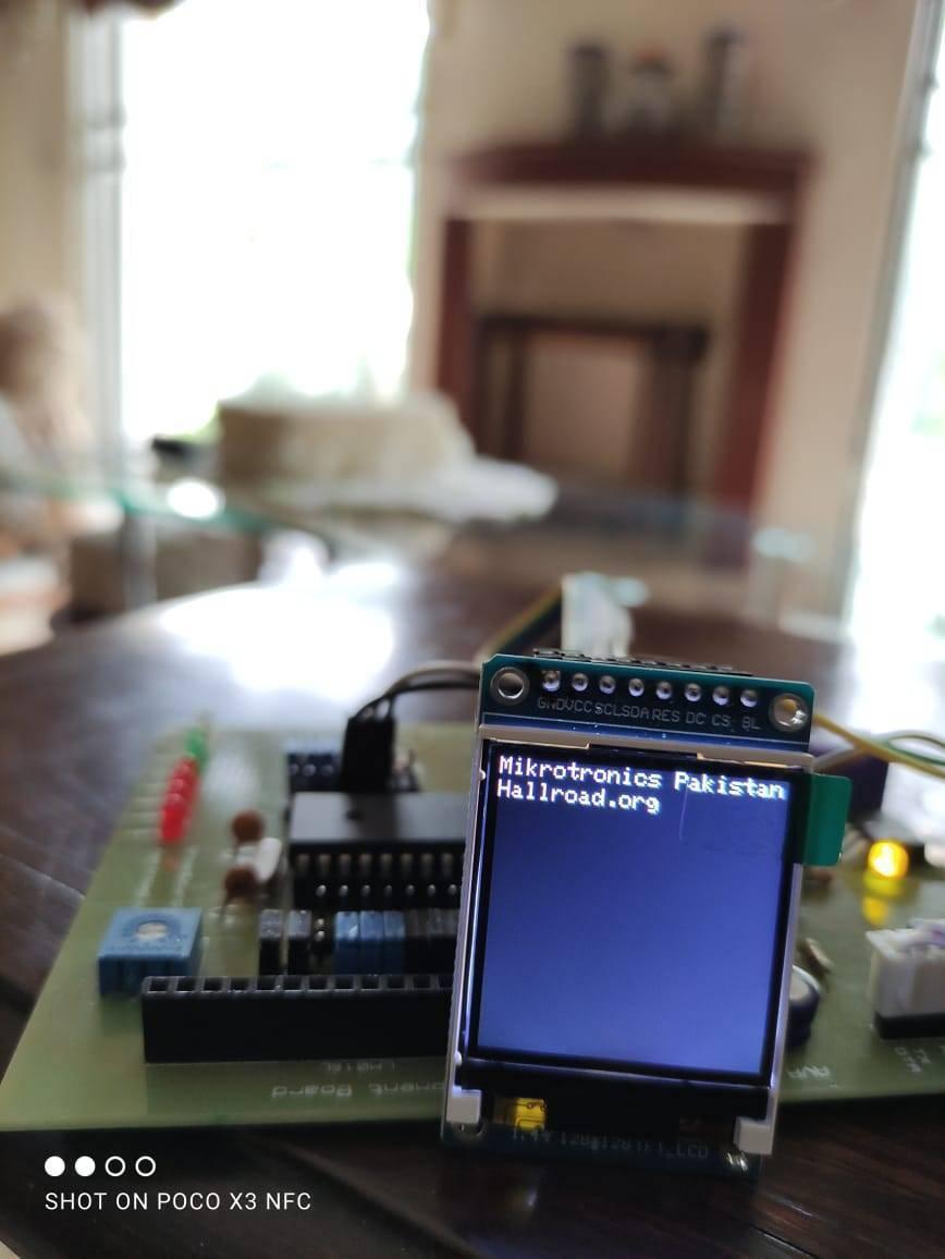 Mikroduino Kiwi Avr ATMEGA32 Arduino Ready Development Board Without LCD Without Microcontroller - connected to a small rectangular LCD screen displaying "Mikrotronics Pakistan Hallroad.org".