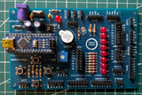 Mikroduino Nano — Arduino Nano Trainer Development Board And Learning Shield Board Made - a blue rectangular circuit board featuring an Arduino Nano, a buzzer, ten red LEDs, a potentiometer, and headers.
