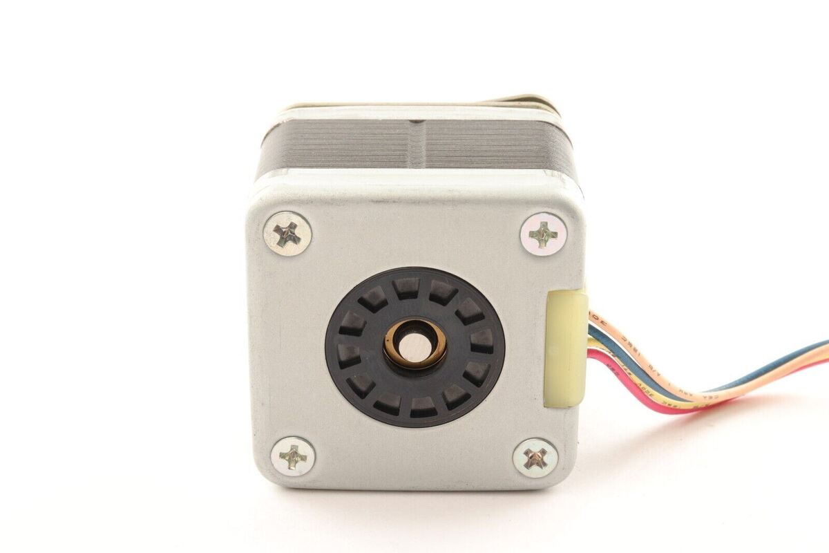 Minebea Bipolar 4 Wire Stepper Stepping Motor - a square silver metal housing with a central circular port and four attached colored wires.