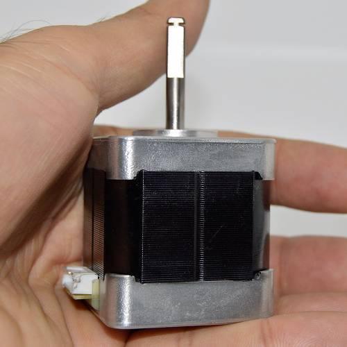 Minebea Japan d Cut Shaft NEMA 17 Stepper Motor For 3d Printer CNC - the silver metal body, black motor casing, and a white electrical connector.