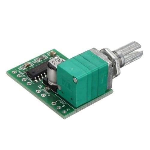 Mini 2 Channel Digital USB Audio Amplifier Board Module PAM8403 With Volume Control Potentionmeter - a green circuit board with a silver potentiometer knob and a cylindrical capacitor.