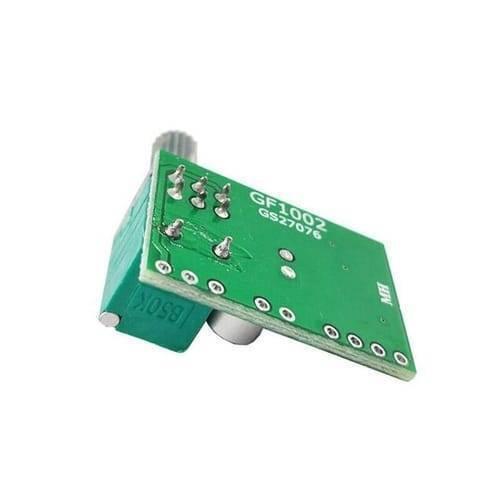 Mini 2 Channel Digital USB Audio Amplifier Board Module PAM8403 With Volume Control Potentionmeter - the green circuit board with a B50K potentiometer and soldered pins.