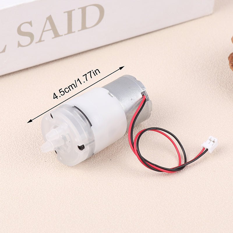 Mini 5V Water Pump Diaphragm Pump Micro Self Priming Suction Drinking Fountain Water Pump Water Dispenser Pump - a silver metal motor attached to a white plastic pump head with two red and black wires ending in a white connector.
