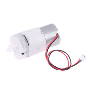 Mini 5V Water Pump Diaphragm Pump Micro Self Priming Suction Drinking Fountain Water Pump Water Dispenser Pump - a cylindrical silver motor attached to a white plastic pump head with two nozzles and a red and black wire lead.