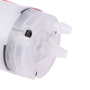 Mini 5V Water Pump Diaphragm Pump Micro Self Priming Suction Drinking Fountain Water Pump Water Dispenser Pump - a close-up view of the white plastic pump head featuring two protruding hose connectors and a black mounting screw.