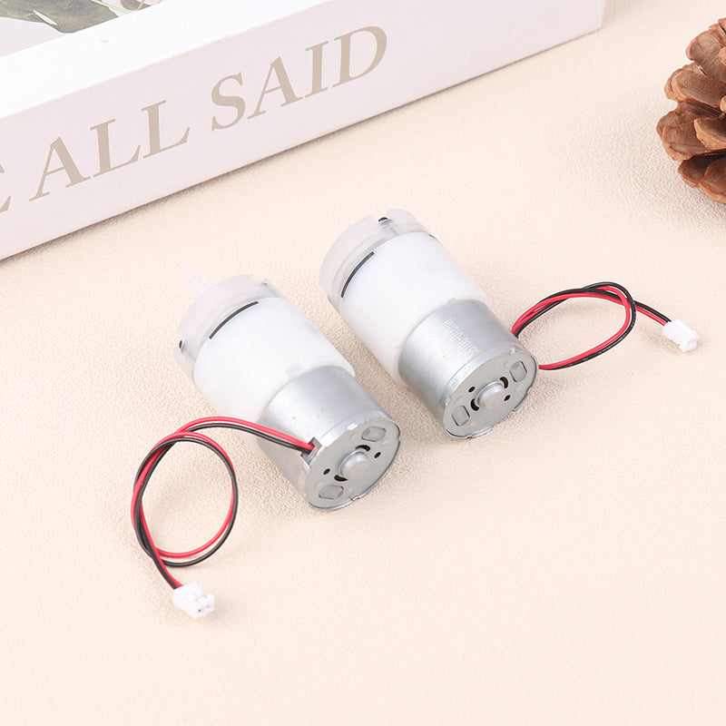Mini 5V Water Pump Diaphragm Pump Micro Self Priming Suction Drinking Fountain Water Pump Water Dispenser Pump - two white and silver cylindrical diaphragm pumps with attached red and black wires ending in white connectors.
