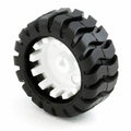 Mini Car Wheel Tyre 43mm For N20 DC Gear Motor | Best Arduino Product Store Digilog.pk - a black rubber tyre with a tread pattern mounted on a white plastic wheel hub.