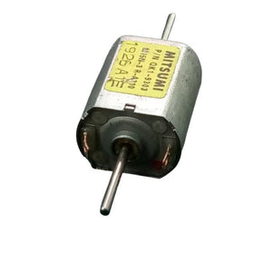 Mini Flat 030 Electric Motor DC 12V-24V 19500RPM Dual Axle Shaft - a silver, rectangular DC motor with two shafts and a yellow label with text.