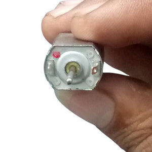 Mini Flat 030 Electric Motor DC 12V-24V 19500RPM Dual Axle Shaft - close-up of the silver motor end with two metal terminals and a red dot indicator.