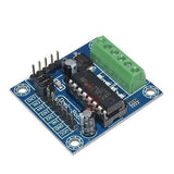 Mini Motor Drive Shield Expansion Board L293D Module For Arduino Uno Mega 2560 - a blue circuit board with an L293D chip, a green terminal block, pin headers, and two small capacitors.