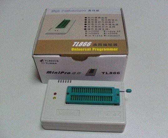 Mini Pro TL866CS USB Bios Universal Programmer - shown with its white retail box, featuring a grey programmer unit with a green ZIF socket and two LEDs.