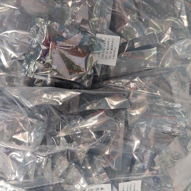 Mini Router UPS Board 40W V2.6 for Router & Modem in Pakistan - shown in multiple individual clear plastic bags, each with a small white label displaying text including HW-DZ-302.