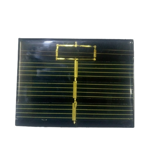 Mini Solar 60x80mm 0.50V - a rectangular black solar panel featuring a gold-colored grid pattern and a central vertical conductive strip.