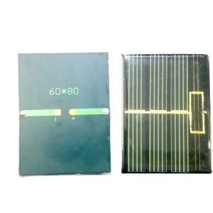 Mini Solar 60x80mm 0.50V - shown from both sides, featuring a dark green back with "60*80" text and a black solar cell front with gold grid lines.