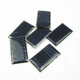 Mini Solar Panel 3V 1W - a collection of six small, rectangular, black solar panels with visible horizontal cell lines arranged on a white background.