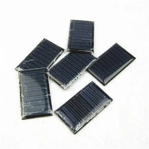 Mini Solar Panel 3V 1W - a collection of six small, rectangular, black solar panels with visible horizontal cell lines arranged on a white background.