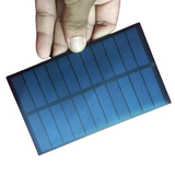 Mini Solar Panel 6V 1.5W Solar Panel - a rectangular, blue, grid-patterned photovoltaic panel with a black frame.