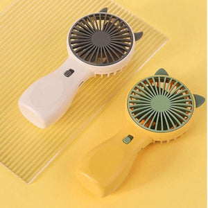Mini USB Rechargeable Small Handheld Fan | Portable Table Fan Wholesale - one white and one yellow handheld fan with cat-ear designs and a central power button on each handle.