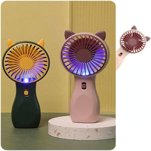 Mini USB Rechargeable Small Handheld Fan | Portable Table Fan Wholesale - two portable fans with animal-ear designs in dark green and pink, each featuring a central power switch.