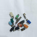 Mini Vibration Motor MT35 3V - shown as a collection of various small vibration motors in assorted plastic housing colours including blue, green, and orange.