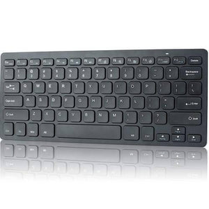 Mini Wireless Keyboard And Mouse For Raspberry Pi - a black, compact wireless keyboard with a standard QWERTY layout and a reflective surface below.