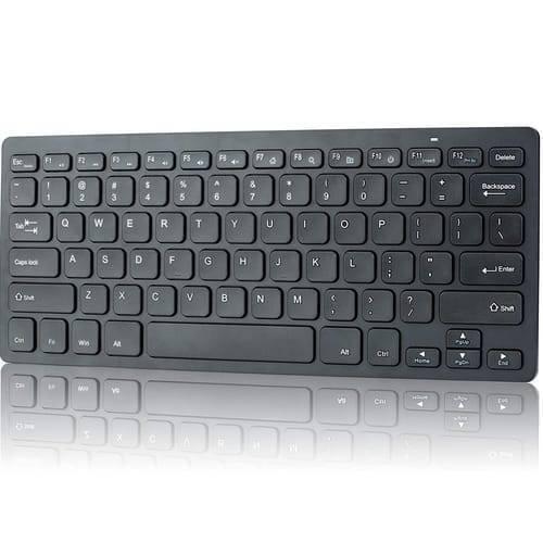 Mini Wireless Keyboard And Mouse For Raspberry Pi - a black, compact wireless keyboard with a standard QWERTY layout and a reflective surface below.