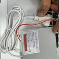 Mirror LED power supply - a white rectangular unit with a connected power cord and plug, showing a label with technical specifications.