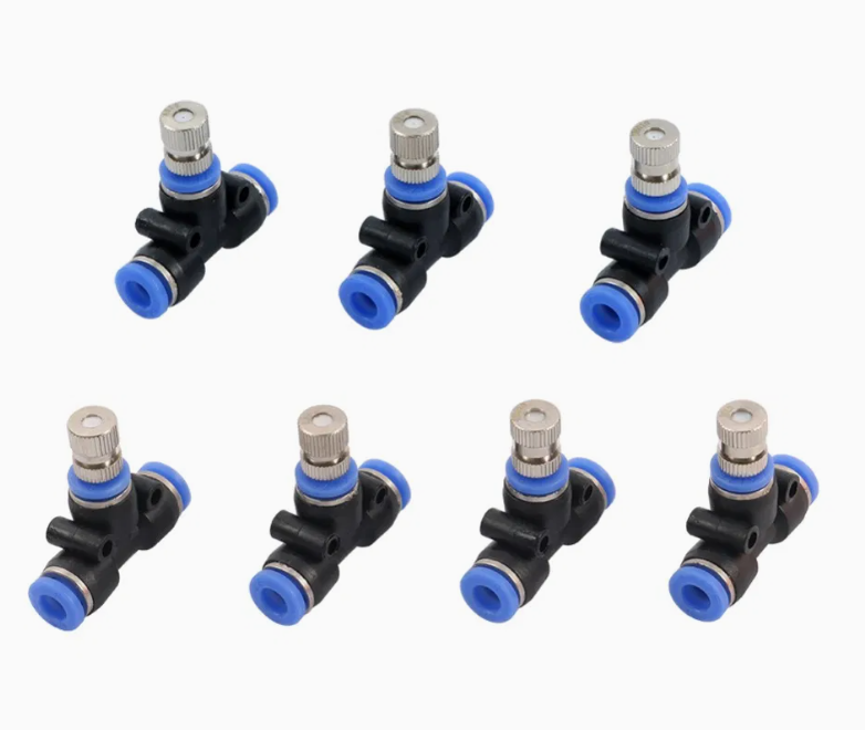 Mist Pump 6mm Output Coupling - shown as a collection of seven black and blue T-shaped pneumatic connectors with metal adjustment knobs.