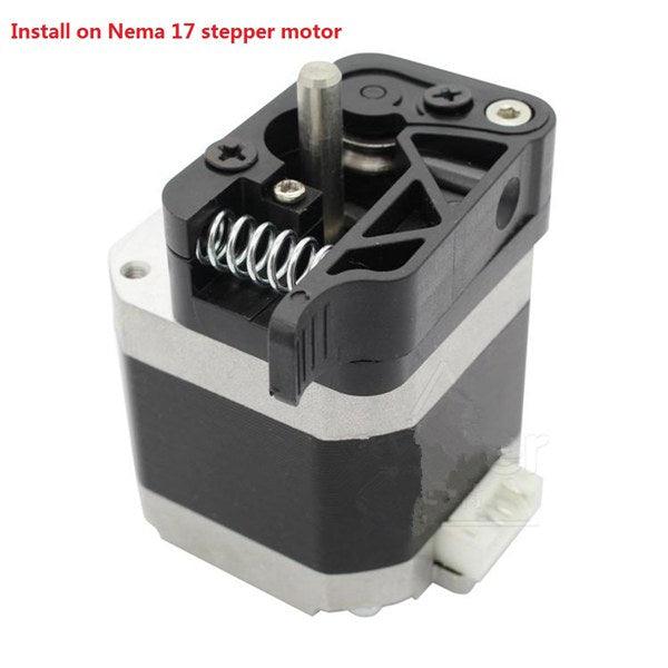 MK8/9 Dual Extruder Feed Device Part For 3d Printer 1.75mm Filament - 1( Right Side) - shown as a black and silver metal assembly installed on a Nema 17 stepper motor with a visible spring.
