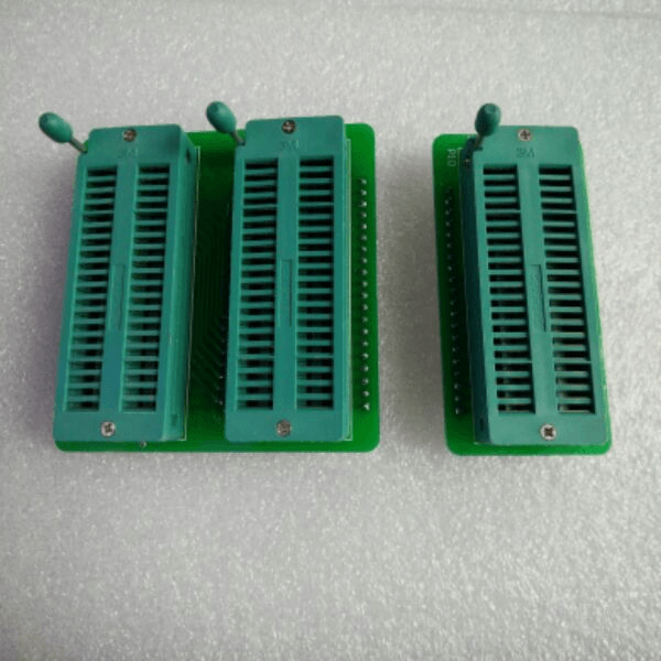 ML-258 TF-M10 LED Digital 7 Segment Tester. - two green circuit boards with three ZIF sockets and lever-actuated pin connectors.