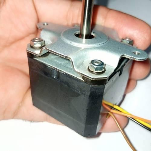 ML17A3 Bipolar NEMA17 Stepper Motor With Shock Absorber - a close-up of the black motor body, metal mounting bracket, shaft, and colored wires.