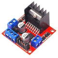 Motor Driver Module L298N For Arduino Dual h Bridge Motor Driver - a red circuit board with a black heat sink, blue screw terminals, two cylindrical capacitors, and pins.