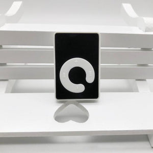 MP3 Music Player With Handsfree - small rectangular black device with a white C-shaped control panel featuring playback and volume symbols.