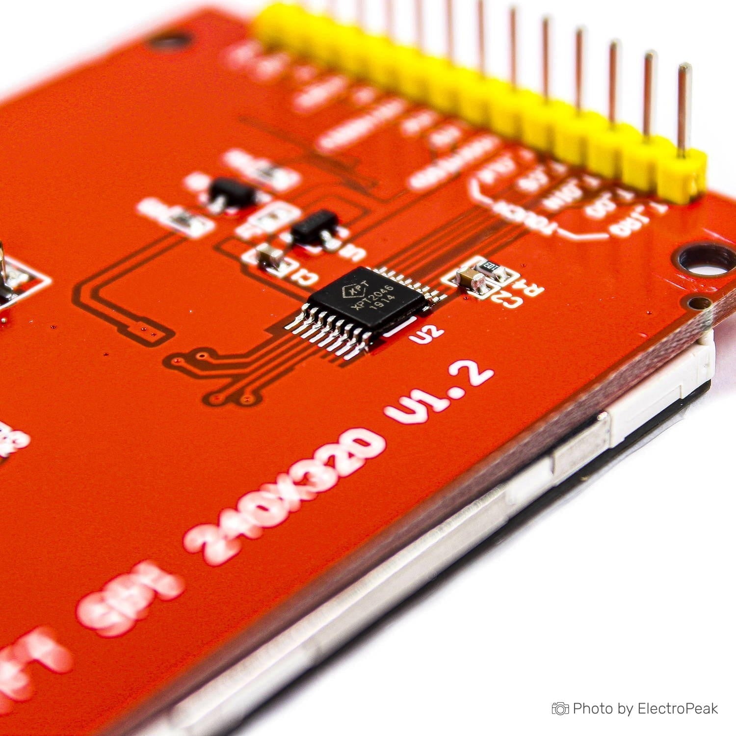 MSP2807 2.8 Inch 320*240 SPI Serial TFT LCD Module Display Screen With Touch Panel Driver IC ILI9341 For MCU - a close-up of the red circuit board showing the XPT2046 chip, surface-mount components, and a yellow header connector.