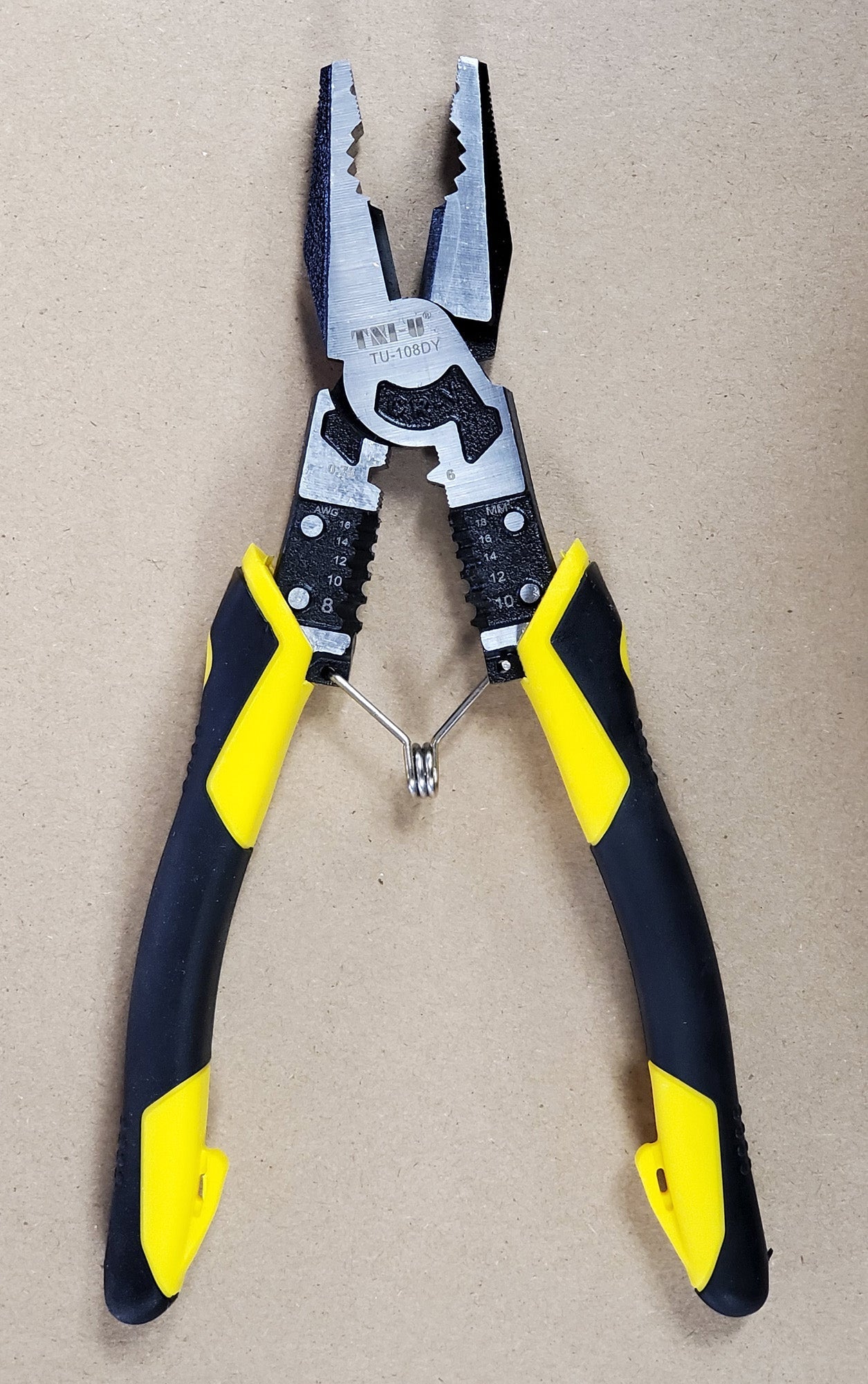 MULTI TU-108DY plier/plass by TNI u company - a yellow and black multi-functional wire stripping tool with a spring-loaded hinge, shown against a plain background.