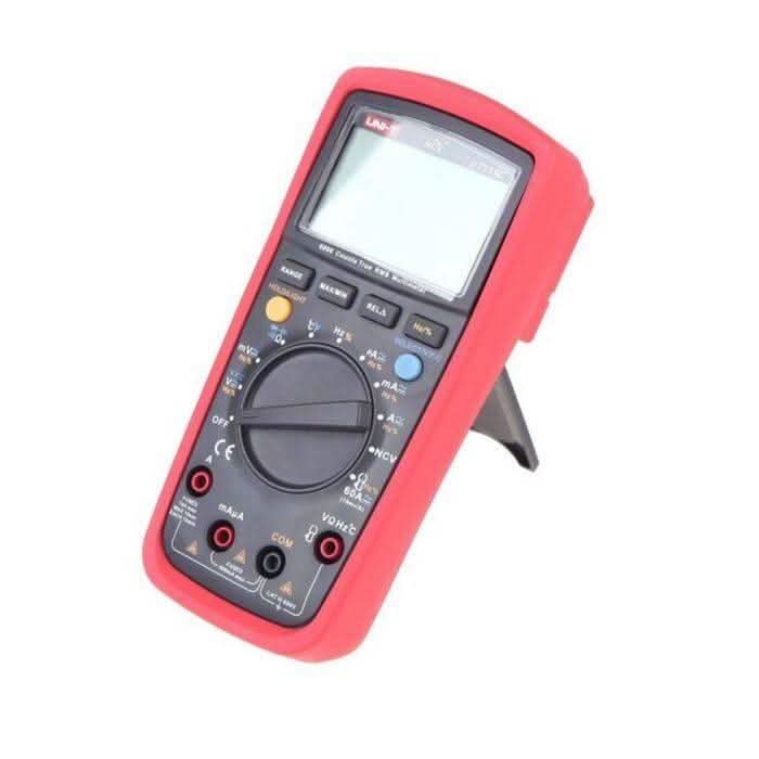 Multimeter digital UNI-T UT139C - in a red protective case, featuring a blank LCD screen, a central rotary dial, control buttons, and input ports.