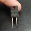 MUR1060F Ultrafast Recovery Rectifier Diode - a black, rectangular two-pin electronic component held by fingers, showing the model number printed on it.