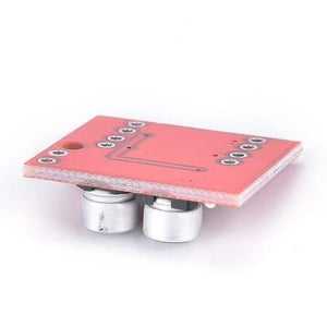 MX1508 Mini Dual Channel 1.5A DC Motor Driver Module Mini L298N Replacement - shown from a side angle featuring a red circuit board with two silver cylindrical components.
