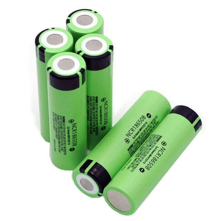 NCR18650B 3.7V to 4.2V 2000mAh Lithium battery 18650 Cell Battery - NCR18650B lithium-ion batteries, showing a group of five green cylindrical 18650 cells with printed labels, arranged upright and lying down.